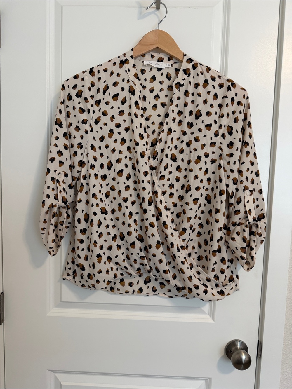 All in Favor Beige Leopard Print Surplice Blouse